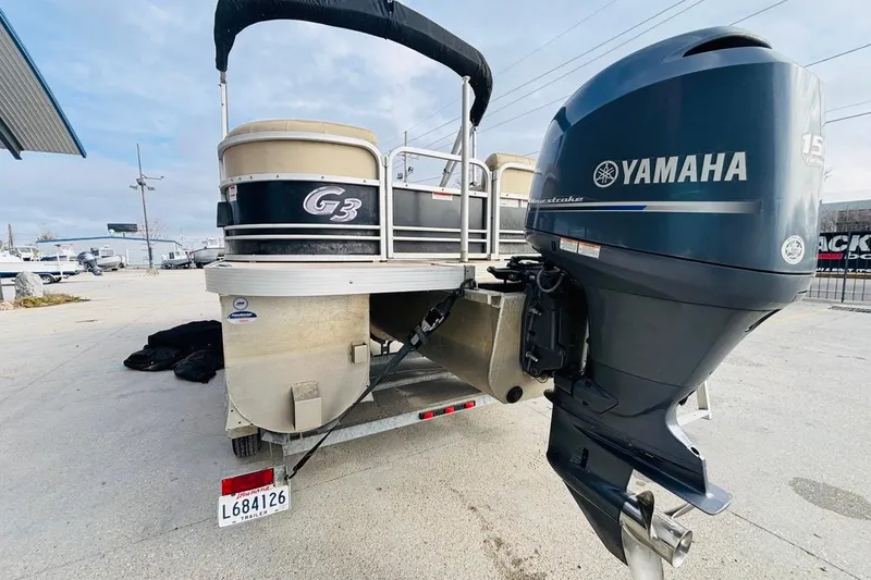 Slide: The Image of 2014 SunCatcher V322 RC pontoon boat with Yamaha outboard motor on trailer. - 5