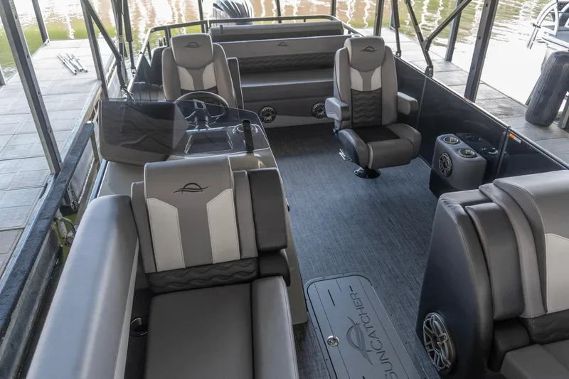 Slide: The Image of Luxurious interior of 2026 SunCatcher Diamond Elite 326 SL pontoon boat with plush seating. - 10