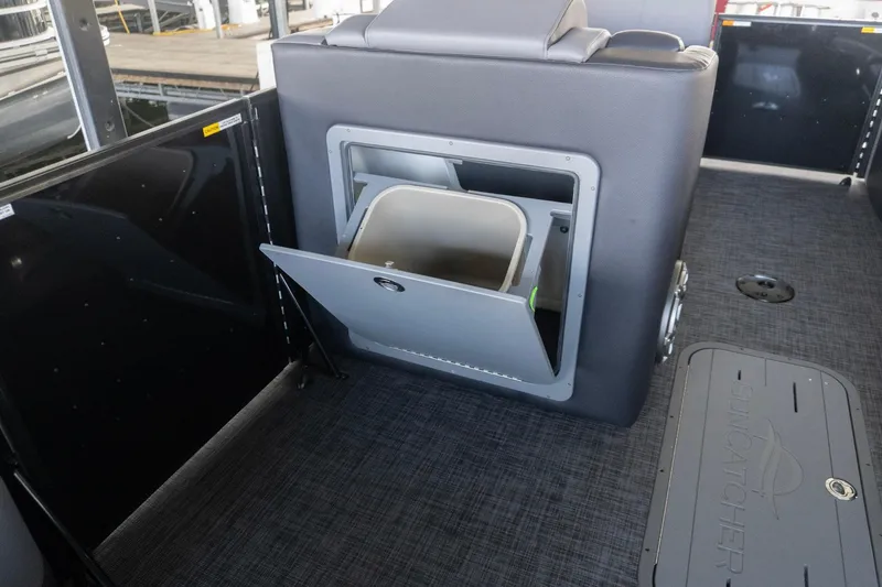 Slide: The Image of Interior of 2026 SunCatcher Diamond Elite 326 SL with built-in storage compartment. - 16