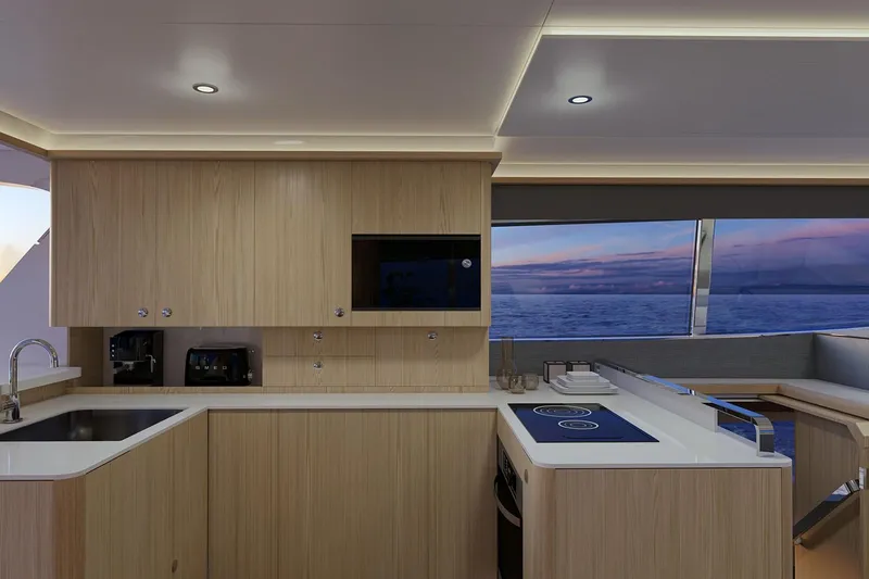 Slide: The Image of Manufacturer Provided Image: Luxurious interior of 2026 Aquila 42 Yacht with modern kitchen and ocean view. - 12