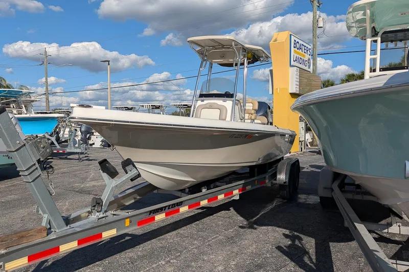 Slide: The Image of 2014 Key West 246 Bay Reef boat on trailer at Boater's Landing. - 3