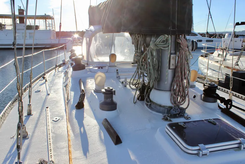 Slide: The Image of Deck view of a 1973 Nautor Swan 44 sailboat with rigging and winches. - 13
