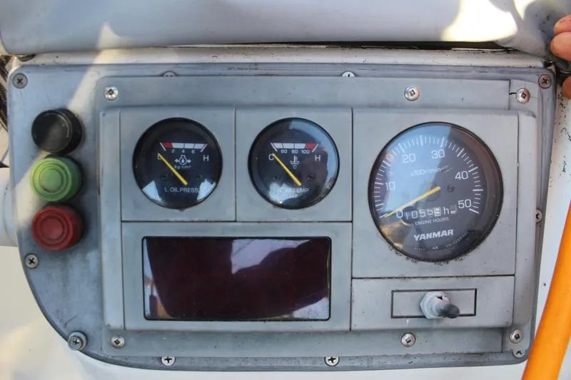Slide: The Image of Instrument panel of a 1973 Nautor Swan 44 sailboat with Yanmar engine gauges. - 20
