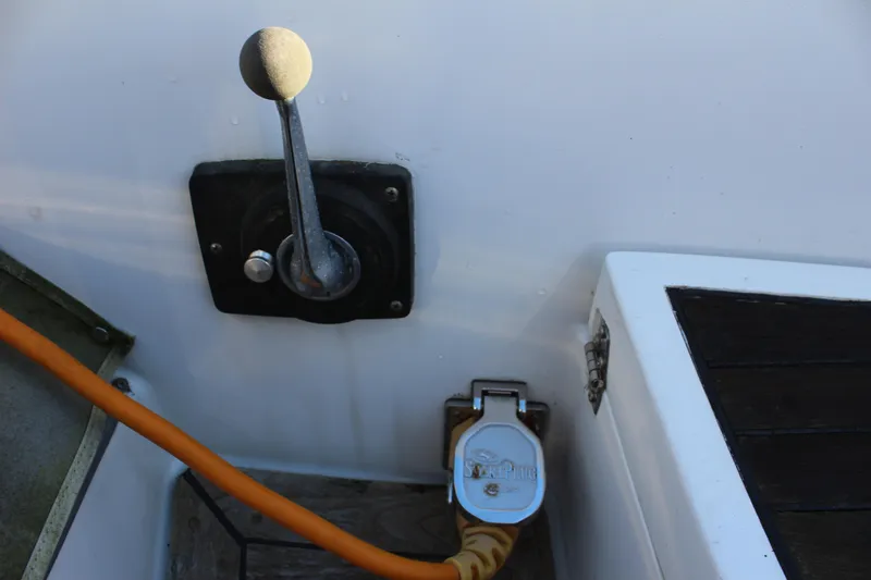 Slide: The Image of Close-up of a 1973 Nautor Swan 44 boat's control lever and power socket. - 21