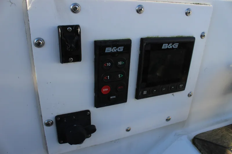 Slide: The Image of Control panel on a 1973 Nautor Swan 44 sailboat featuring B&G navigation equipment. - 22
