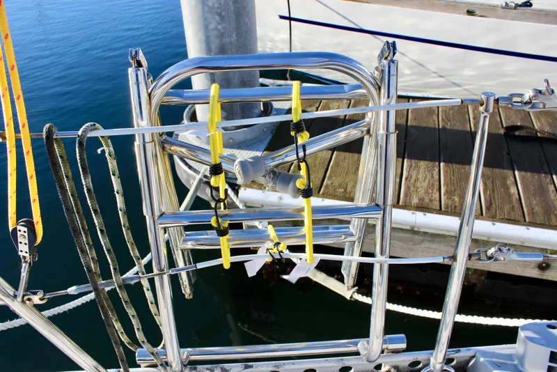 Slide: The Image of Stainless steel ladder on 1973 Nautor Swan 44 yacht, docked at marina. - 26