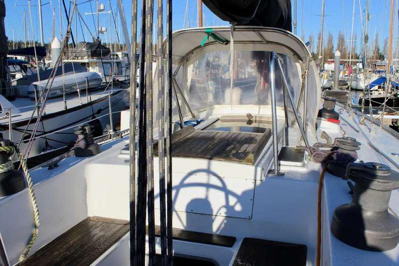Slide: The Image of Cockpit of a 1973 Nautor Swan 44 sailboat docked in a marina. - 28