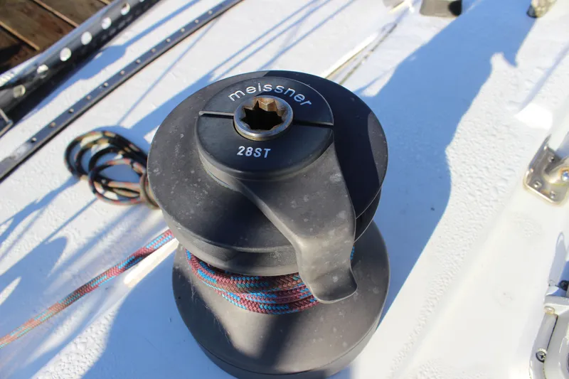 Slide: The Image of Winch on 1973 Nautor Swan 44 sailboat deck, featuring Meissner 28ST model. - 30