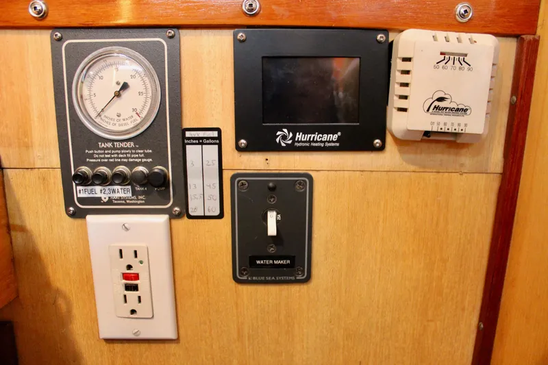 Slide: The Image of Control panel of a 1973 Nautor Swan 44 yacht with gauges and switches. - 45