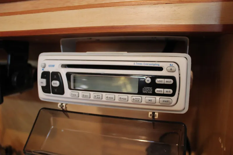Slide: The Image of Vintage CD player in a 1973 Nautor Swan 44 yacht interior. - 48