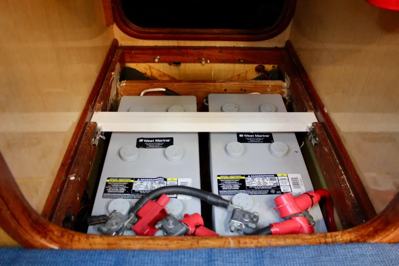 Slide: The Image of Battery compartment of a 1973 Nautor Swan 44 sailboat with West Marine batteries. - 87