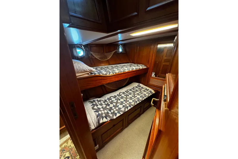 Slide: The Image of Cozy wooden cabin with bunk beds on 1974 Doggersbank 63 yacht. - 9