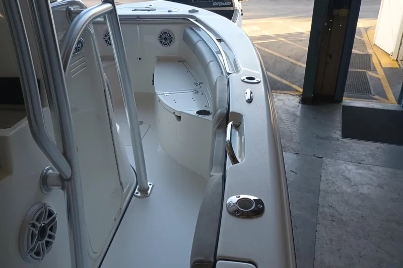 Slide: The Image of 2017 Seapro 219 boat interior with seating and stainless steel railings. - 12