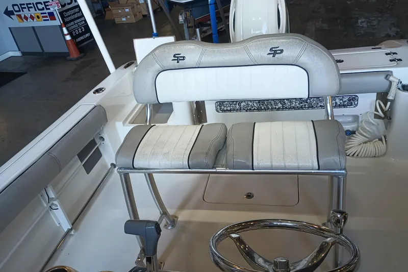 Slide: The Image of 2017 Seapro 219 boat interior with dual seats and steering wheel. - 18