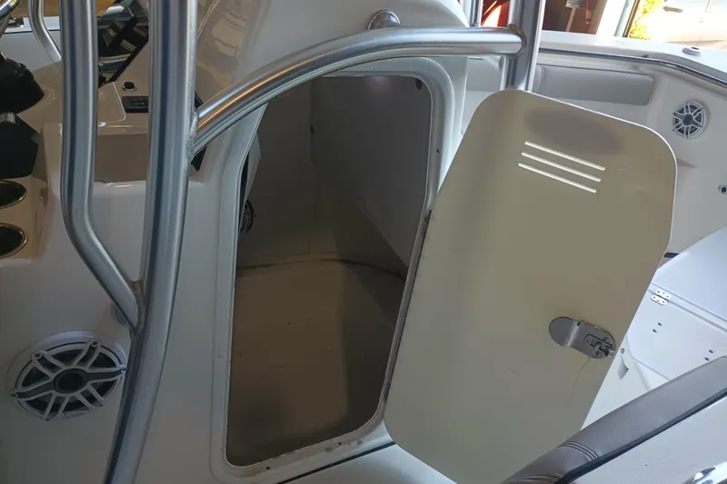 Slide: The Image of 2017 Seapro 219 boat interior with open storage compartment and visible speakers. - 30