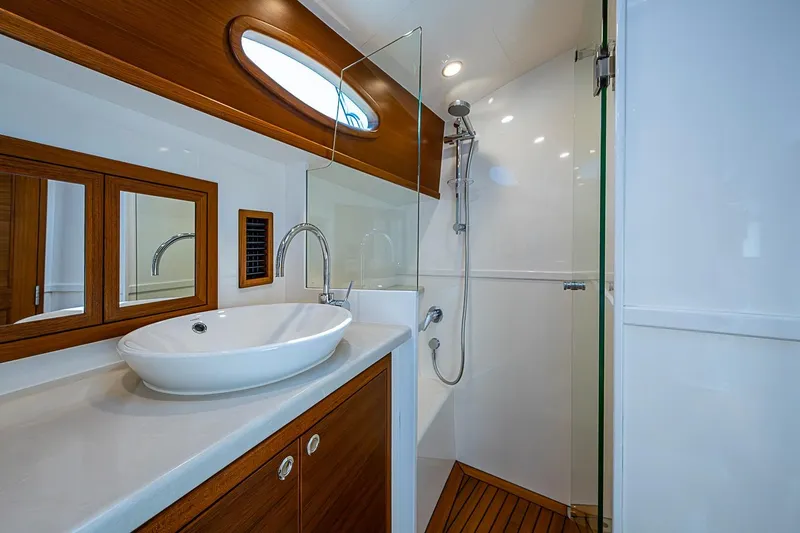 Slide: The Image of Luxurious bathroom in 2024 Grand Banks 44 Eastbay yacht with modern fixtures. - 29