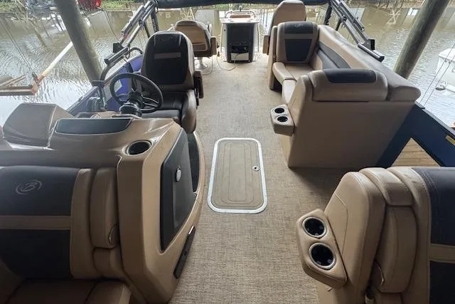 Slide: The Image of 2023 Barletta Cabrio 24CC interior with luxurious seating and modern design. - 12