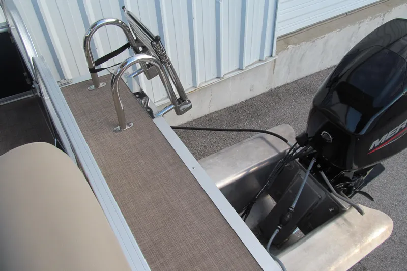 Slide: The Image of 2024 Sun Tracker Bass Buggy 16 XL Select with Mercury outboard motor and swim ladder. - 15