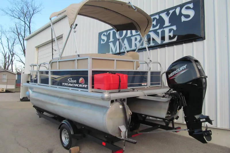 Slide: The Image of 2024 Sun Tracker Bass Buggy 16 XL Select pontoon boat with Mercury engine. - 3