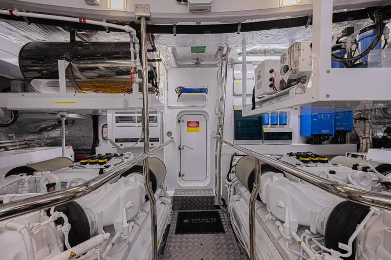 Slide: The Image of Engine room of 2025 Sunseeker 88 Yacht, featuring advanced machinery and equipment. - 10