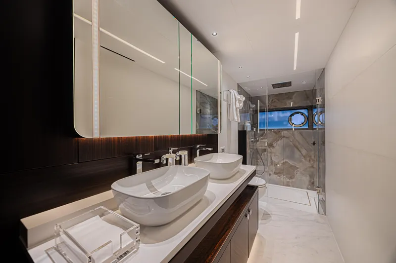 Slide: The Image of Luxurious bathroom in 2025 Sunseeker 88 Yacht with dual sinks and modern shower. - 32