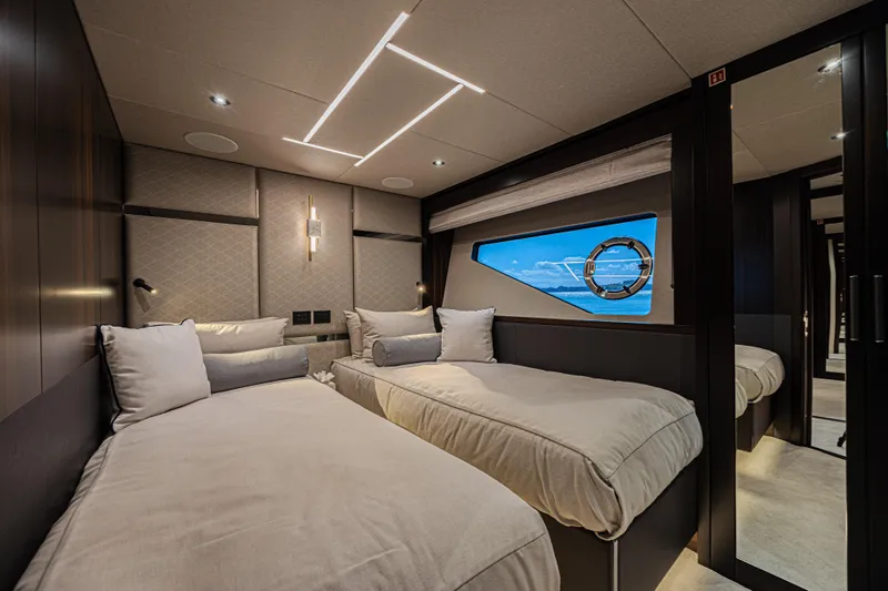 Slide: The Image of Luxurious twin cabin interior of 2025 Sunseeker 88 Yacht with ocean view. - 35