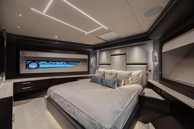 Slide: The Image of Luxurious bedroom interior of 2025 Sunseeker 88 Yacht with modern design and elegant furnishings. - 38
