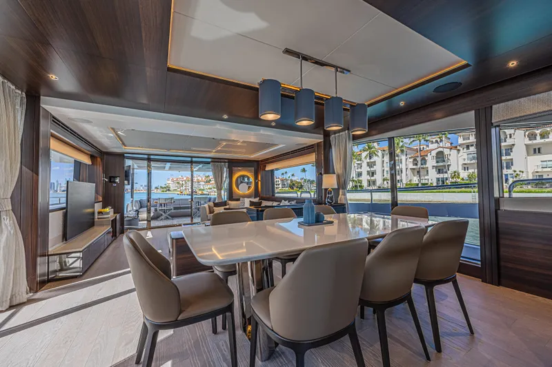 Slide: The Image of Luxurious interior of 2025 Sunseeker 88 Yacht with elegant dining area and scenic views. - 63