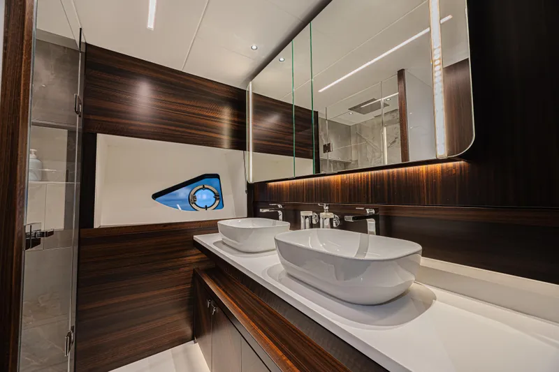 Slide: The Image of Luxurious bathroom in 2025 Sunseeker 88 Yacht with dual sinks and modern design. - 8