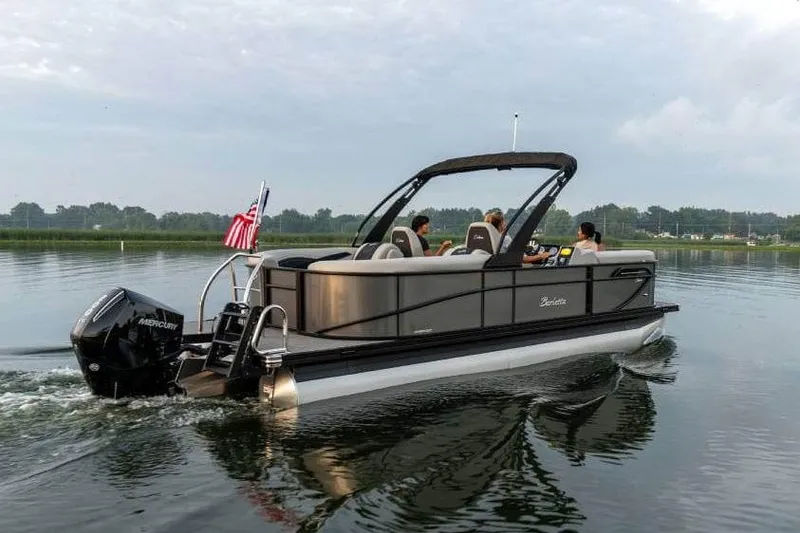 Slide: The Image of Manufacturer Provided Image: 2026 Barletta Cabrio 22QC pontoon boat cruising on a calm lake. - 4