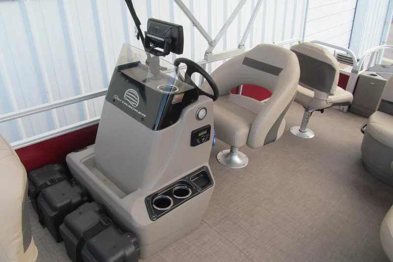 Slide: The Image of 2023 Sun Tracker Bass Buggy 18 DLX interior with steering console and seating. - 11