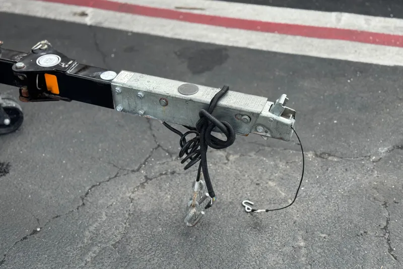 Slide: The Image of Trailer hitch of a 2012 Bombardier Sea Doo 210 Challenger on asphalt. - 29