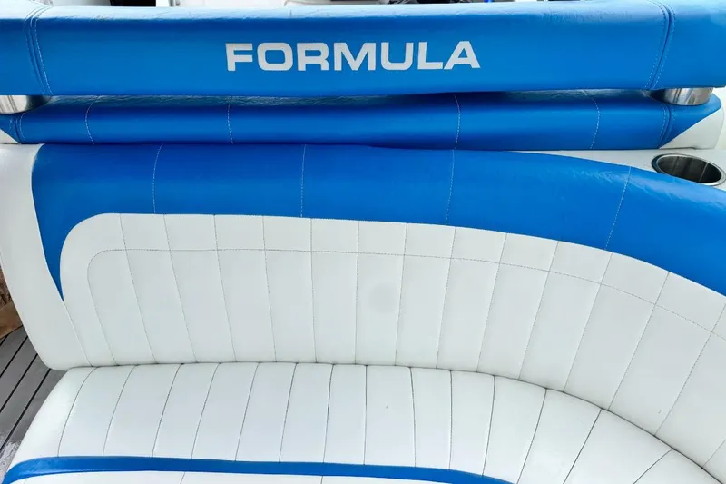 Slide: The Image of Blue and white seating on 1998 Formula 330 Sun Sport boat. - 11
