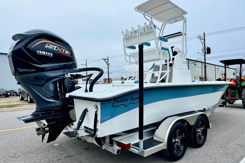 Slide: The Image of 2026 Shallow Sport 24 Modified V boat with Yamaha engine on trailer. - 4