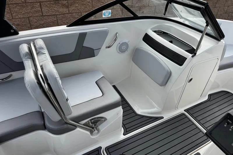 Slide: The Image of 2022 Bayliner VR5 Bowrider I/O interior with seating and dashboard details. - 23