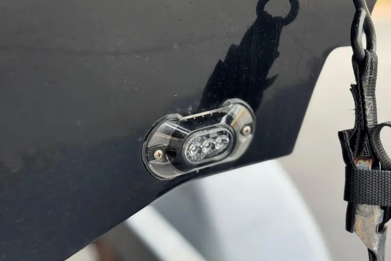 Slide: The Image of 2022 Bayliner VR5 Bowrider I/O stern detail with LED light and strap. - 8