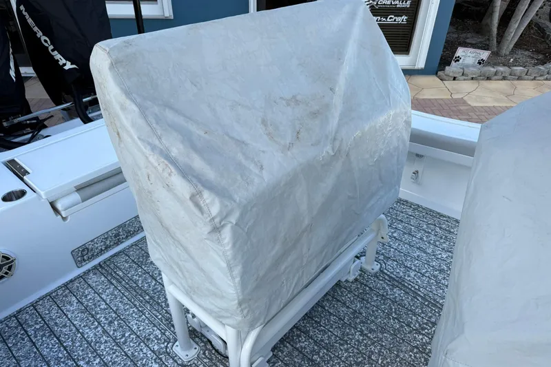 Slide: The Image of Covered console on 2022 Caymas 28 HB Twin boat deck. - 19