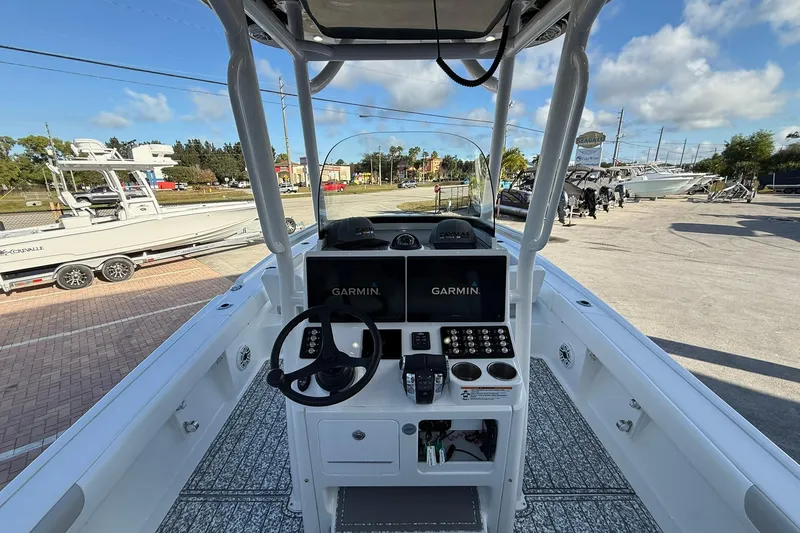 Slide: The Image of 2022 Caymas 28 HB Twin boat dashboard with Garmin navigation system. - 20