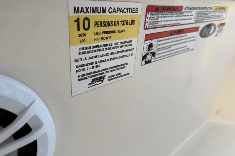 Slide: The Image of 2022 Stingray 216 CC boat capacity label, maximum 10 persons or 1378 lbs. - 38