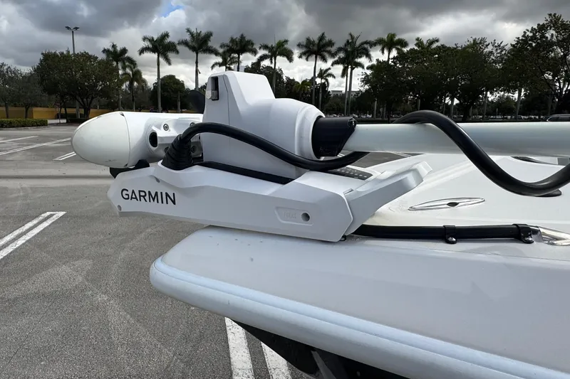 Slide: The Image of Garmin marine equipment on 2010 Paramount Sportfisherman boat, parked with palm trees in background. - 24