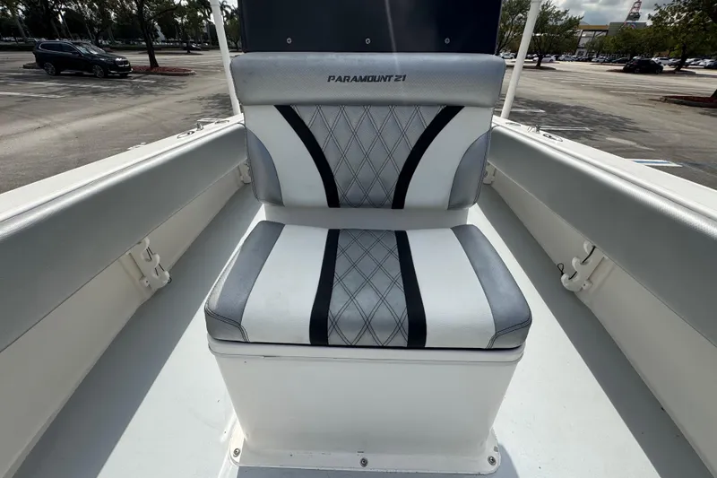 Slide: The Image of 2010 Paramount Sportfisherman 21' boat seat with stylish upholstery in a parking lot. - 35