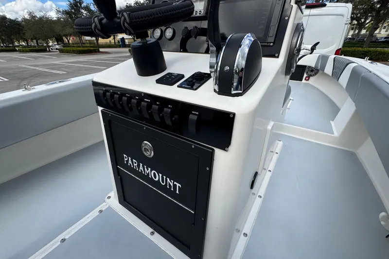 Slide: The Image of 2010 Paramount Sportfisherman 21' boat console with controls and steering wheel. - 41