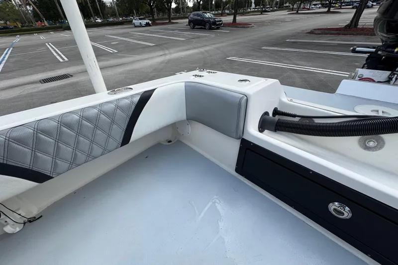 Slide: The Image of Interior view of a 2010 Paramount Sportfisherman 21' boat in a parking lot. - 53