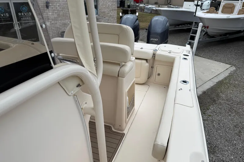 Slide: The Image of 2015 Grady-White Fisherman 257 boat interior with dual engines and seating. - 21