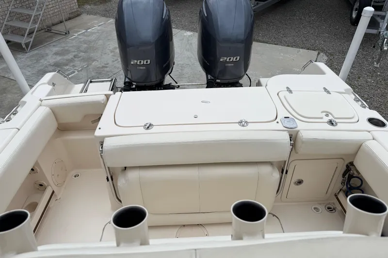Slide: The Image of 2015 Grady-White Fisherman 257 boat interior with dual Yamaha 200 engines. - 23