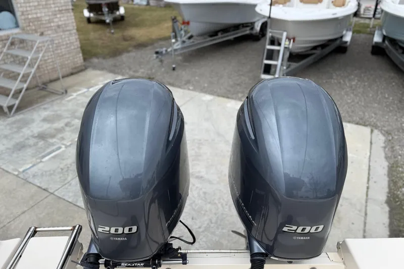 Slide: The Image of Twin Yamaha 200 outboard engines on a 2015 Grady-White Fisherman 257 boat. - 38