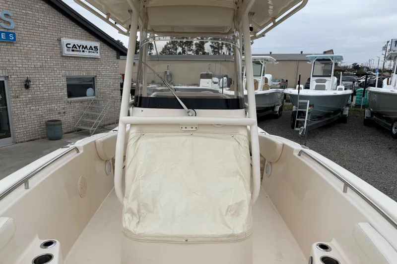 Slide: The Image of 2015 Grady-White Fisherman 257 boat displayed at dealership, surrounded by other boats. - 39