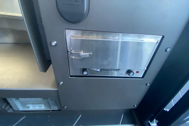 Slide: The Image of Stabicraft 2350 ULTRACAB WT SPORTFISH 2026 interior with Road Chef appliance. - 10