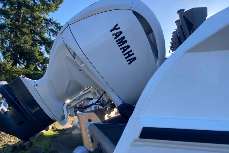 Slide: The Image of Yamaha outboard engine on 2026 Stabicraft 2350 ULTRACAB WT SPORTFISH boat, outdoors. - 3