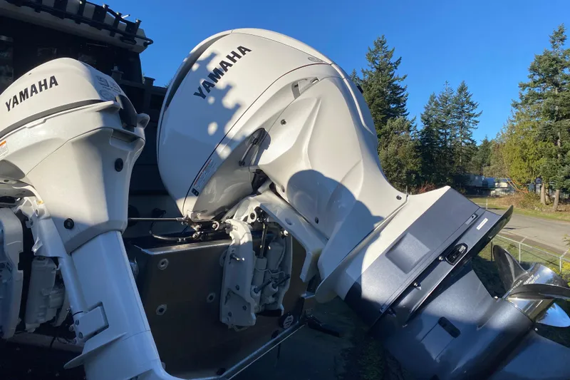 Slide: The Image of 2026 Stabicraft 2350 ULTRACAB WT SPORTFISH with Yamaha outboard motors in a scenic setting. - 4